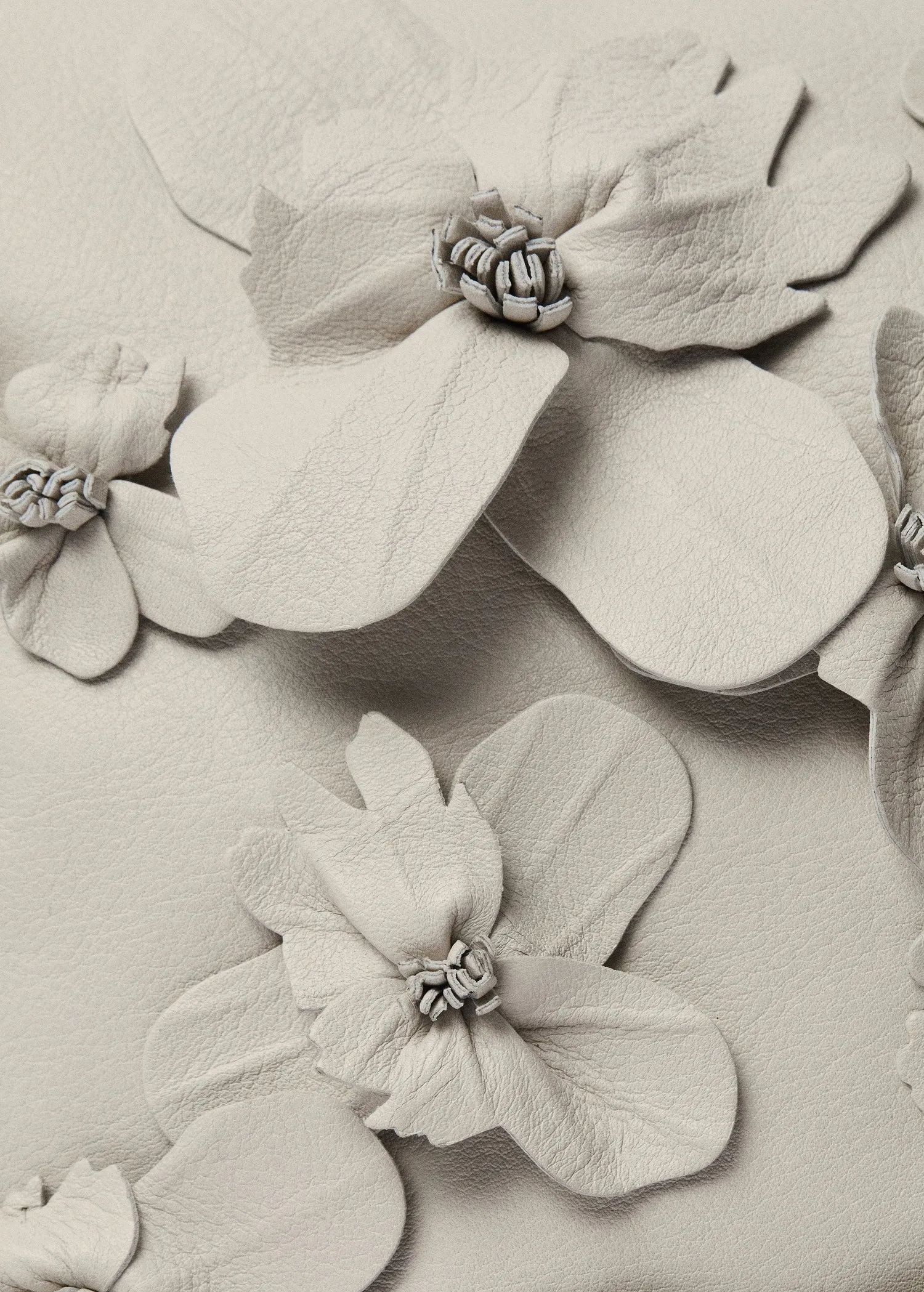Leather handbag with flower detail