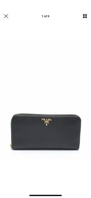 Prada black leather Vitello wallet with gold hardware